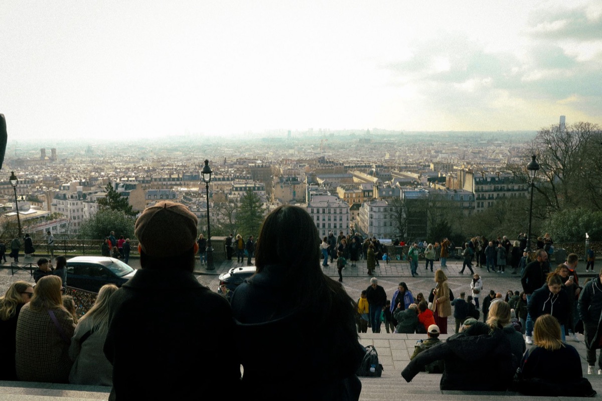 Eiffel Tower with crowd and skyline